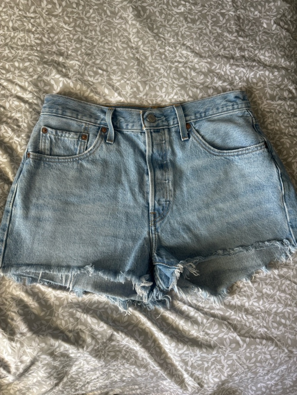 Levi's Light Blue Frayed Denim Cutoff Shorts
